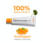 A tube of Avarelle's Vitamin C Brightening Complex Cream, surrounded by water droplets, stating 100% natural vitamin C and 10,000ppm of sea Buckthorn