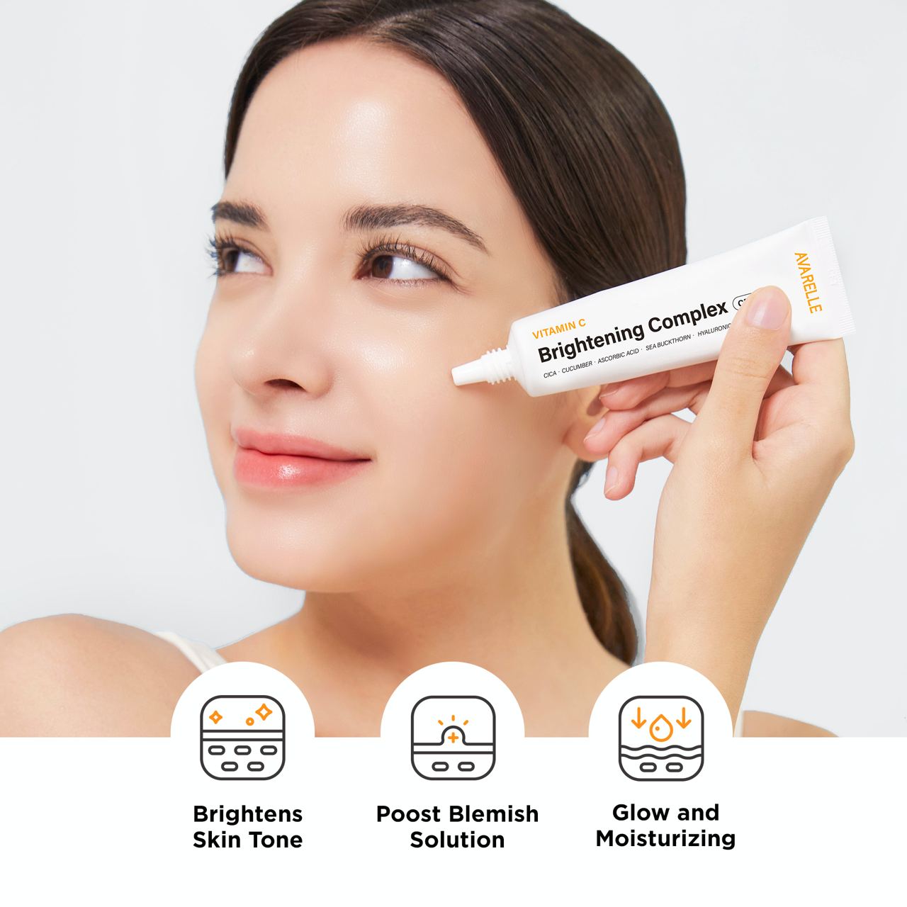 Woman applying Avarelle's Vitamin C Brightening Complex Cream, with icons illustrating the product benefits: brightens skin tone, boosts post blemish solution and provides glow and moisturizing.