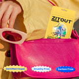 Person holding  pink sunglasses next to a vibrant pink bag, showcasing a yellow Avarelle ZITOUT Invisible (AM) acne patch with certified vegan, cruelty-free, and carbon-free labels.